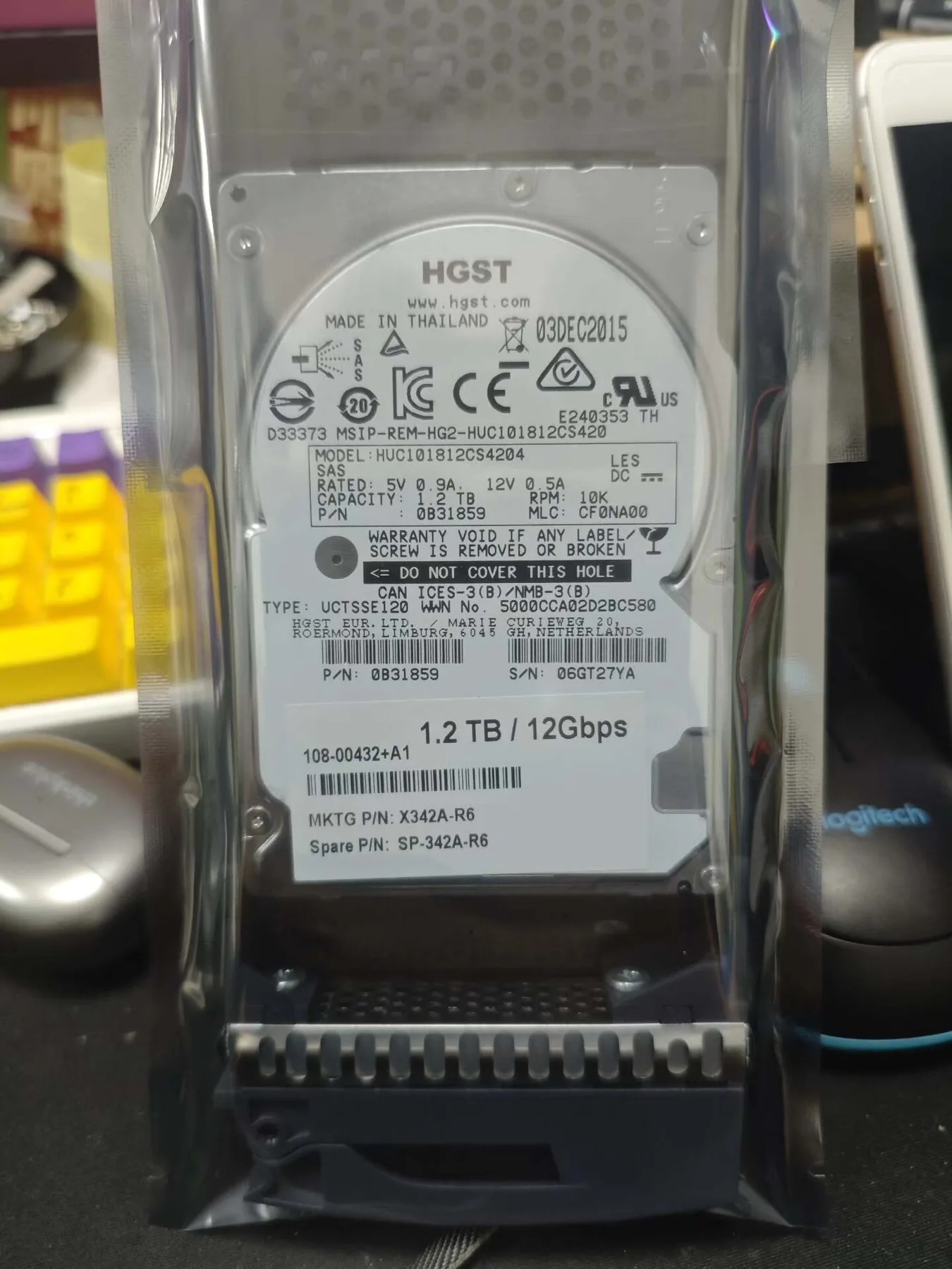 NetApp X342A-R6 1.2TB 10K 12Gb SAS drive label in a carrier